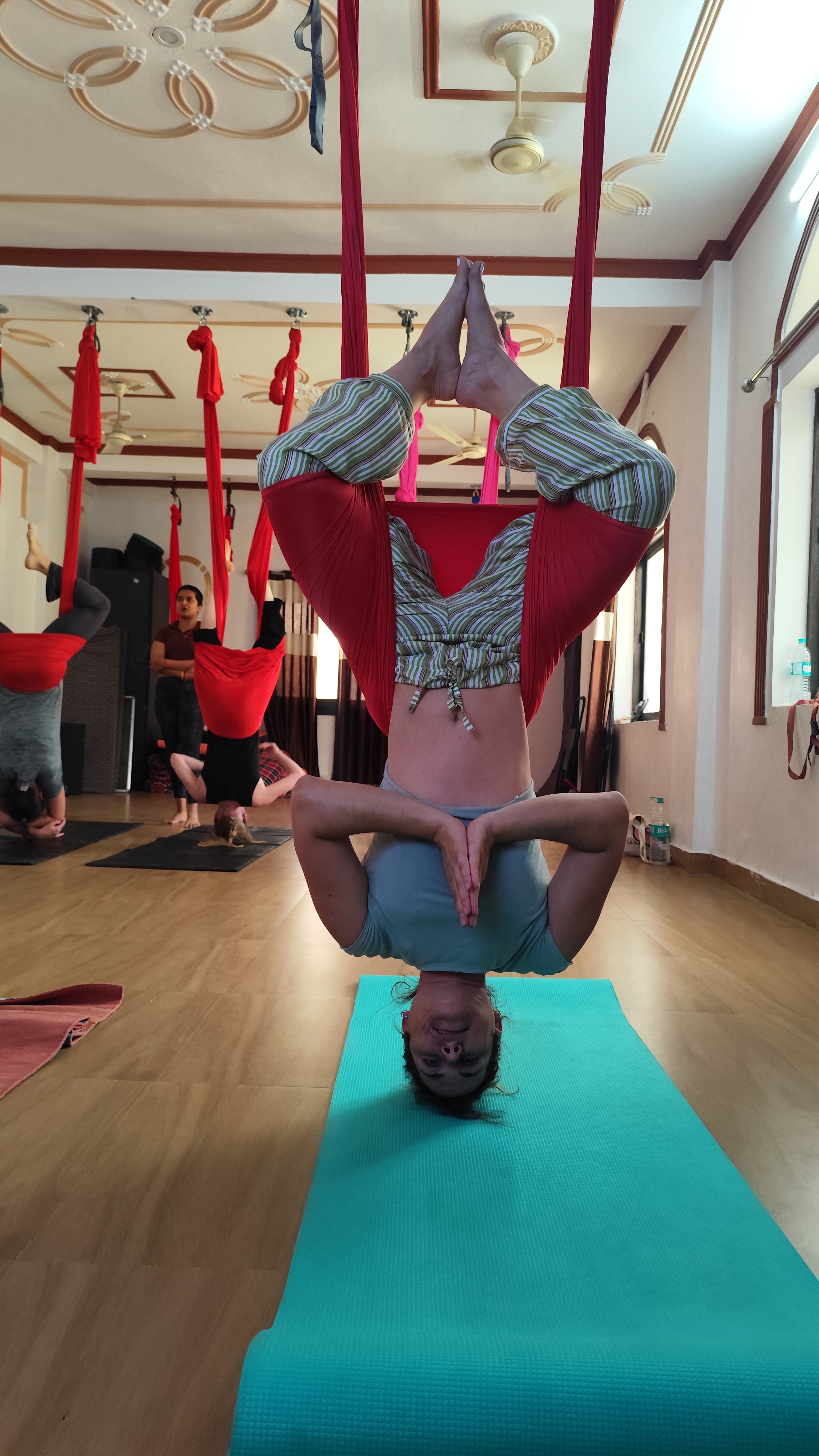 Aerial yoga artistic pose