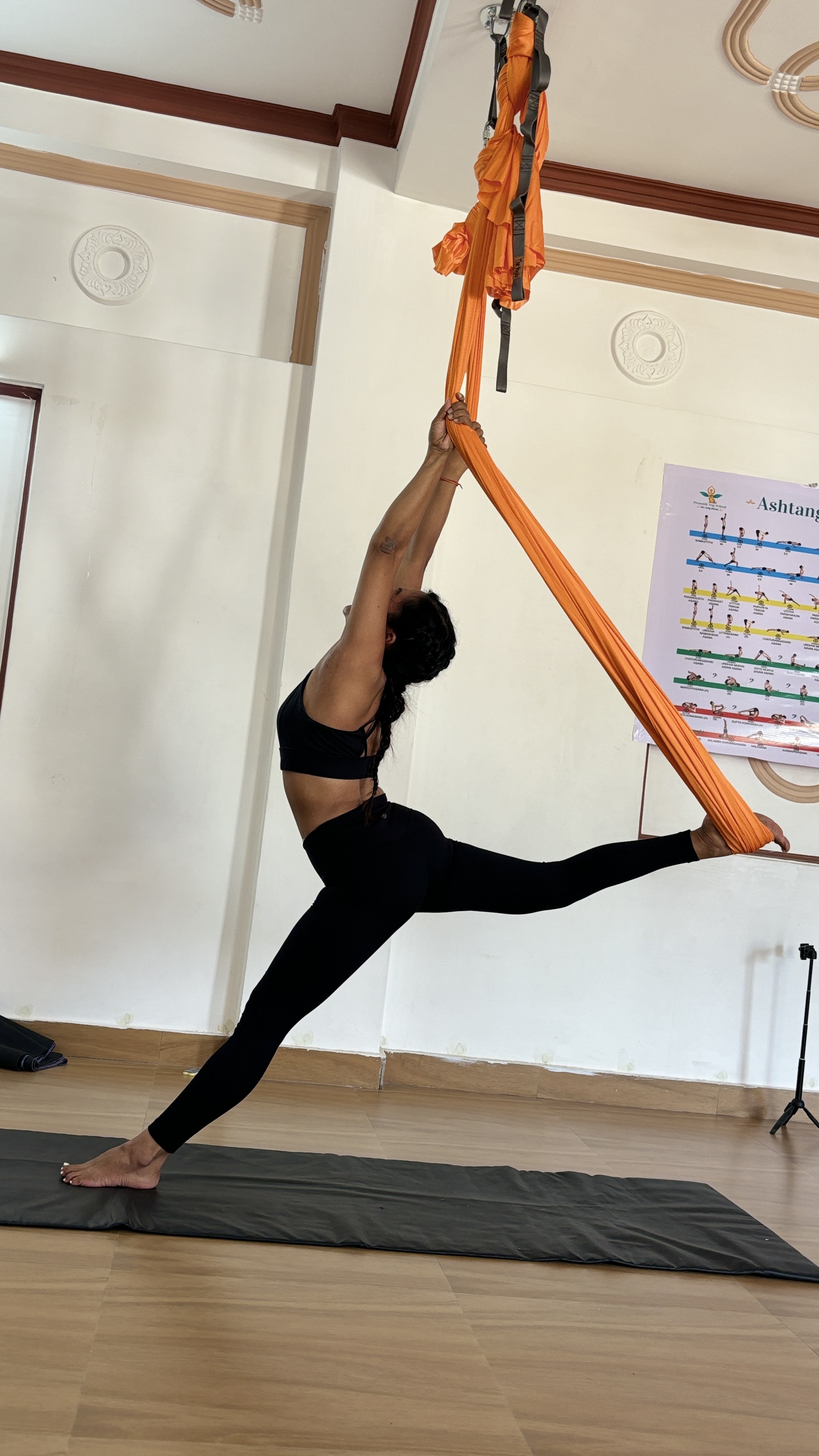 Aerial yoga marina pose
