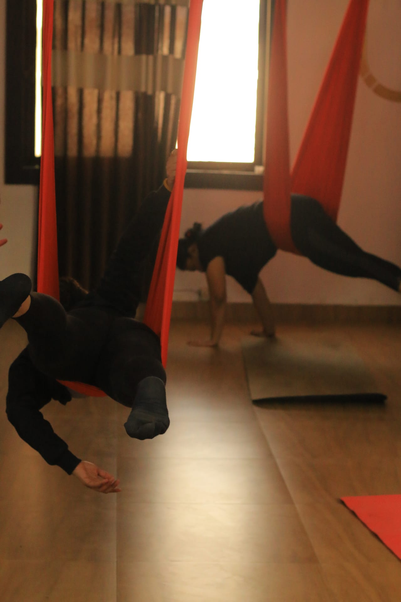 Relaxing aerial yoga pose