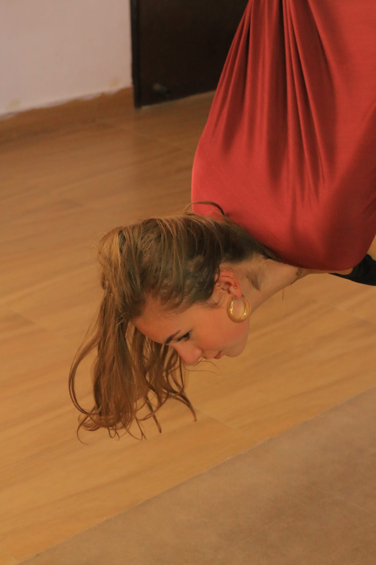 Aerial yoga strength pose
